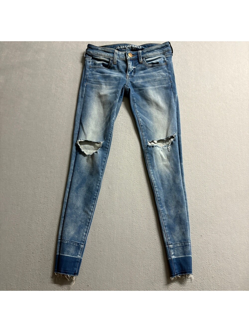 American Eagle Super Low Jegging Jeans Womens 4 Blue Distressed Raw Hem Stretch